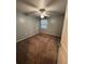 Bright bedroom with ceiling fan and carpeted floor at 13838 Fairway Island Dr # 1432, Orlando, FL 32837