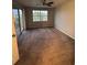 Spacious bedroom with carpet and balcony access at 13838 Fairway Island Dr # 1432, Orlando, FL 32837