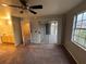Bright bedroom with carpet, ceiling fan and private balcony access at 13838 Fairway Island Dr # 1432, Orlando, FL 32837