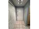 Bright entryway with tiled floor and coat closet at 13838 Fairway Island Dr # 1432, Orlando, FL 32837