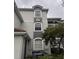 Building exterior showcasing architectural details and landscaping at 13838 Fairway Island Dr # 1432, Orlando, FL 32837