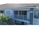 Exterior view of condo balcony with white railings at 13838 Fairway Island Dr # 1432, Orlando, FL 32837