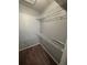 Large walk-in closet with wire shelving at 13838 Fairway Island Dr # 1432, Orlando, FL 32837