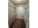 Spacious walk-in closet with wire shelving at 13838 Fairway Island Dr # 1432, Orlando, FL 32837