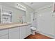 Clean bathroom featuring vanity with ample storage, modern fixtures, and a shower, combining functionality with style at 392 Winter Ridge Blvd # 105, Winter Haven, FL 33881