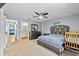 Tranquil bedroom featuring neutral tones, a stylish bed, and ample space, offering a peaceful retreat at 392 Winter Ridge Blvd # 105, Winter Haven, FL 33881