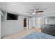 Bright bedroom with walk-in closet and adjacent bathroom at 392 Winter Ridge Blvd # 105, Winter Haven, FL 33881