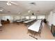 A spacious community room with ample seating, perfect for gatherings and events at 392 Winter Ridge Blvd # 105, Winter Haven, FL 33881