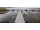 Picturesque lakefront view from the dock; enjoy waterfront living at 392 Winter Ridge Blvd # 105, Winter Haven, FL 33881