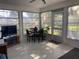 Relaxing sunroom with lots of windows for ample natural light at 5062 El Destino Dr, Leesburg, FL 34748