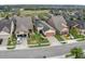Aerial view of house and neighborhood, showcasing street view at 516 Pamplona Pl, Davenport, FL 33837