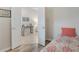 Small bedroom with twin bed and access to office at 516 Pamplona Pl, Davenport, FL 33837