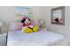 bedroom with Minnie Mouse and beach theme at 516 Pamplona Pl, Davenport, FL 33837