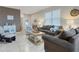 Spacious living room featuring neutral tones and ample natural light at 516 Pamplona Pl, Davenport, FL 33837