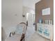 Relaxing living room with rocking chair and decorative cabinet at 516 Pamplona Pl, Davenport, FL 33837
