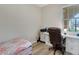 Home office with a desk and comfortable chair at 516 Pamplona Pl, Davenport, FL 33837
