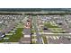 Aerial view showcasing the location of the home within a planned community with nearby roadways and manicured landscapes at 1687 Park Side Ave, Kissimmee, FL 34744