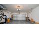 Two-car garage providing ample space for parking and storage at 1687 Park Side Ave, Kissimmee, FL 34744