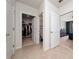Hallway with a view to the bedroom, bathroom and walk-in closet at 1687 Park Side Ave, Kissimmee, FL 34744