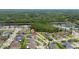 Aerial view highlighting the property's location in a community with lake views and green surroundings at 18035 Cadence St, Orlando, FL 32820