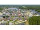 Aerial view of the neighborhood with lake access and well-maintained homes at 18035 Cadence St, Orlando, FL 32820