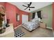 Bedroom featuring neutral carpet, ceiling fan and closet at 18035 Cadence St, Orlando, FL 32820