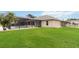 Expansive backyard featuring a screened-in pool and a covered lanai for year-round enjoyment at 1960 Jan Lan Blvd, St Cloud, FL 34772