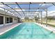 Refreshing screened-in pool providing a private oasis for swimming and relaxing in the backyard at 1960 Jan Lan Blvd, St Cloud, FL 34772