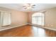 This is a spacious bedroom with hardwood floors and lots of natural light at 1960 Jan Lan Blvd, St Cloud, FL 34772