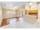 Spacious living room with a ceiling fan, tile flooring, and sliding doors to the pool at 1960 Jan Lan Blvd, St Cloud, FL 34772