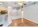 Open-concept living area with tile flooring, modern lighting, and a connected kitchen at 1960 Jan Lan Blvd, St Cloud, FL 34772