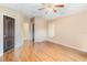 A bright main bedroom with a ceiling fan and an ensuite bathroom at 1960 Jan Lan Blvd, St Cloud, FL 34772