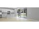 Open kitchen and dining area lead to backyard patio through sliding glass doors at 1488 August Gray Dr, Kissimmee, FL 34744