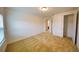 Bedroom with carpeted floor and a double door closet at 6078 Bimini Twist Loop, Orlando, FL 32819