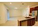 Bright, spacious kitchen with granite counters, stainless steel appliances, and ample cabinet space at 6078 Bimini Twist Loop, Orlando, FL 32819