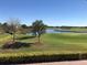 Scenic view of the golf course and lake at 14038 Millington St, Orlando, FL 32832