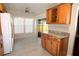 Kitchen boasts wood cabinets, granite countertops, and a breakfast nook at 504 Ridge View Dr, Davenport, FL 33837