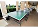 Outdoor ping pong table with net, ready for recreation at 504 Ridge View Dr, Davenport, FL 33837