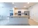 Kitchen featuring stainless steel appliances, granite countertops, and an island at 527 Noble Ave, Davenport, FL 33837