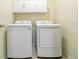 Laundry room with white LG washer and dryer units at 527 Noble Ave, Davenport, FL 33837