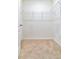 Walk-in closet with ample shelving and carpet flooring at 527 Noble Ave, Davenport, FL 33837