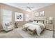 Spacious Primary bedroom with a king-size bed and plenty of natural light at 9650 Bay Pine Ln, Orlando, FL 32832