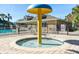 Community pool area with a mushroom-shaped water feature for  at 9650 Bay Pine Ln, Orlando, FL 32832