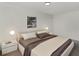 This stylish bedroom features clean lines and warm tones for a restful atmosphere at 1234 Lynwood Ave, Apopka, FL 32703