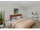 Cozy bedroom featuring a warm color palette, minimalist decor, and a soothing ambiance at 1234 Lynwood Ave, Apopka, FL 32703