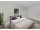 This bedroom is decorated with a modern minimalist style, offering a clean and serene space at 1234 Lynwood Ave, Apopka, FL 32703