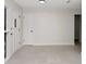Bright and airy entryway with neutral tile flooring and a modern front door at 1234 Lynwood Ave, Apopka, FL 32703