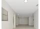 Bright hallway features natural light, smooth flooring, and inviting access to various rooms at 1234 Lynwood Ave, Apopka, FL 32703