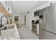 Modern kitchen featuring stainless steel appliances and granite countertops for a sleek and functional space at 1234 Lynwood Ave, Apopka, FL 32703