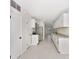 Bright kitchen featuring stainless steel appliances, granite countertops, and white cabinetry at 1234 Lynwood Ave, Apopka, FL 32703